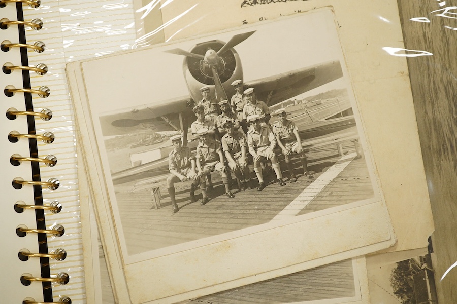 Two photograph albums containing an archive of WWII photos mainly of the RAF in Japan and the Far East, including a number of photos of RAF aircraft, aircraft carriers, Royal Naval ships, photographs of crew, military so